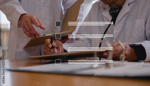Tableau sur toile Medical professor and medical students checking and analysing disease diagnosis with check list boxes healthcare technology, medical research digital innovation