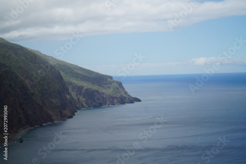 Sweeping Panorama of Green Volcanic Sea Cliffs Along Atlantic Co