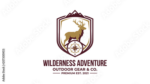 A deer standing proudly within a shield emblem on a wilderness adventure logo outdoors