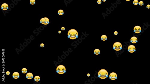 Laughing crying emoji icons floating on a black background a fun and expressive element for World emoji day, social media and digital communication
