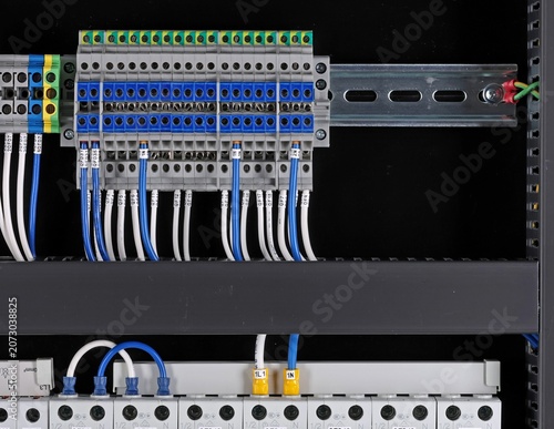 Connecting electrical modules using copper insulated electrical wires in the electrical switchboard. 