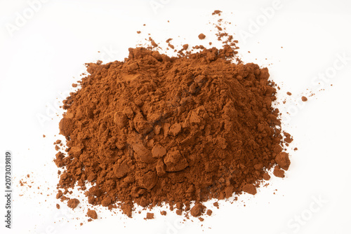 A pile of cocoa powder isolated on a white background.