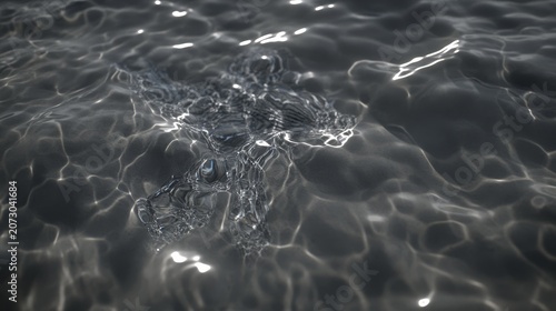 Close-up view of rippling water surface with sunlight reflecting off the waves and creating patterns