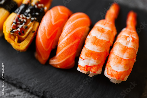 Tablou pe pânză Colorful sushi platter showcases fresh ingredients and artful presentation at a