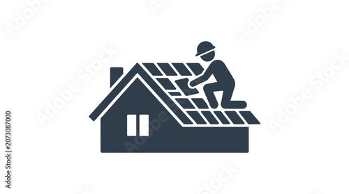 Roofer repairing shingles on a residential building demonstrates professional home maintenance work.