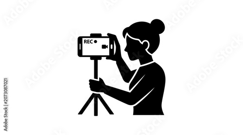 Vlogger records high quality video content using a smartphone mounted on a tripod for social media broadcasting.