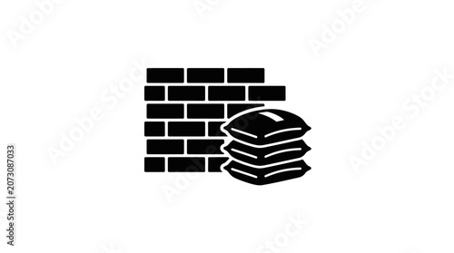 Sandbags stacked against a brick wall provide essential flood protection and emergency structural reinforcement during disasters.