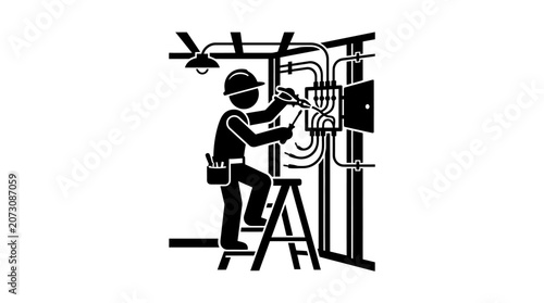 Electrician stands on a ladder to connect complex wiring inside an open electrical junction box.