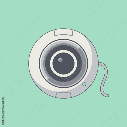 A modern digital webcam sits against a solid light green background