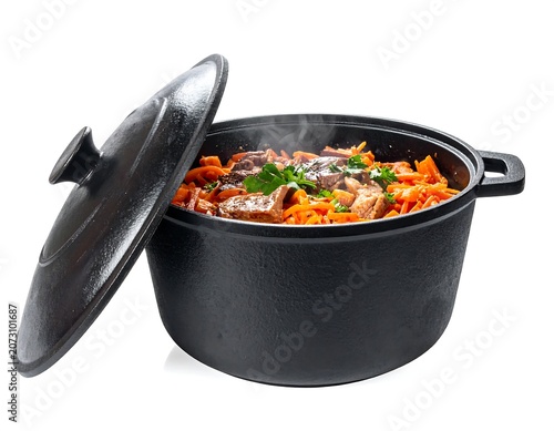 A black cast-iron pot filled with steaming vegetables