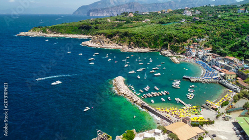 Drone view of Marina di Puolo seaside and crystal clear waters Italy