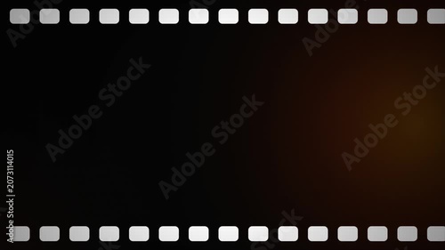 Retro Cinematic Film Border with Warm Light Leak and Classic Sprocket Holes for Nostalgic Storytelling 4k video