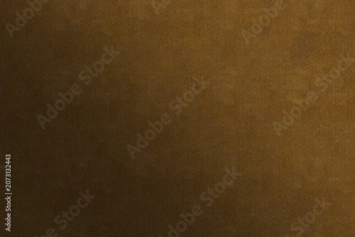 фотографія A uniform warm brown background featuring a subtle, fine-grained texture and a clear, perceptible soft gradient shift, creating a matte, organic surface reminiscent of high-quality art paper