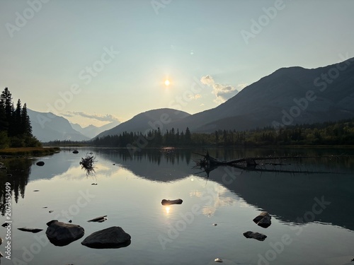 Sunset Reflection On A Mountain Lake In The Canadian Rockies