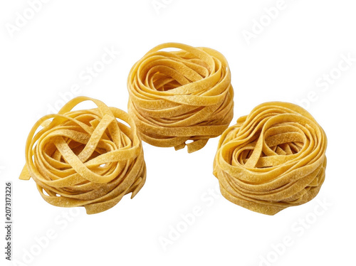 Golden fettuccine nests arranged in a row with soft studio lighting isolated on transparent background