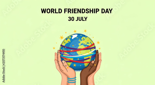 Diverse hands holding a stylized world globe for world friendship day