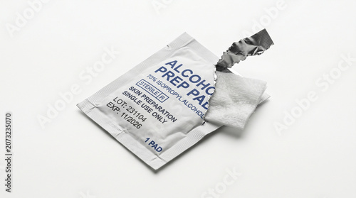 Single use alcohol prep pad in open sterile medical packaging with sterilization