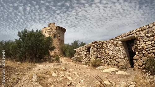 POV Walk Past the Ruins of a Historic Watchtower on the Mallorca Coastline, Spain