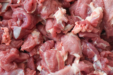 piles of raw and fresh lamb or goat meat obtained during Eid al-Adha in Indonesia.