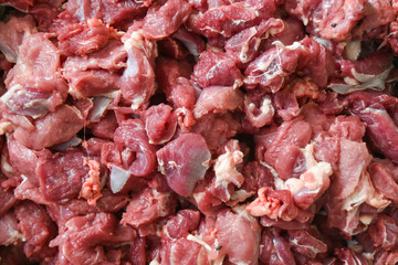piles of raw and fresh lamb or goat meat obtained during Eid al-Adha in Indonesia.