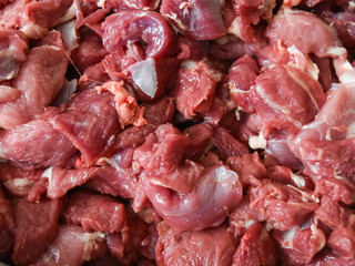 piles of raw and fresh lamb or goat meat obtained during Eid al-Adha in Indonesia.