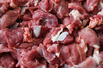piles of raw and fresh lamb or goat meat obtained during Eid al-Adha in Indonesia.