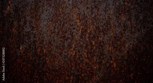 Close up of a rusty metal surface with a textured pattern.