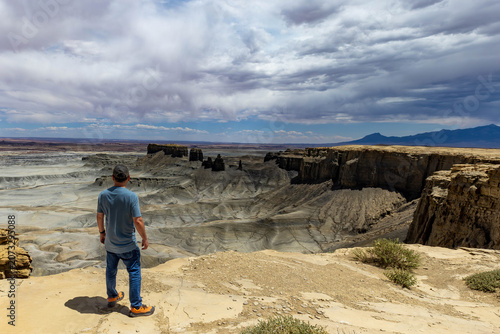 Man admiring the Moonscape Overlook near Hanksville, Utah