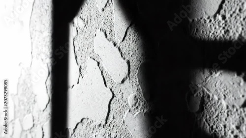 Stark Shadows and Light Play on Abstract Rough Surface Texture.