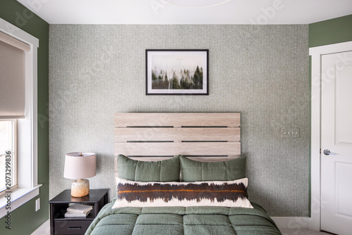 Cozy Modern Green Bedroom with Wooden Slat Headboard and Textured Accent Wall