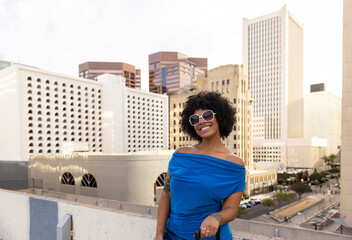 Pretty Black portrait confident outdoors city downtown