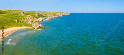 Canvas Print emerald sea bay with rocky coast,  summer sea outdoor scene