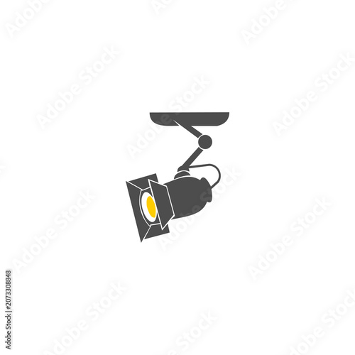 A clean, stylized vector illustration of a professional studio spotlight mounted on a track, representing stage lighting, production, photography, and cinematic focus.