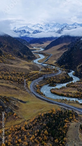 Bild auf Leinwand Winding river road in Bayinbuluk Valley, Xinjiang, China
