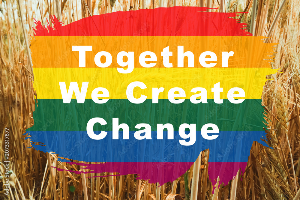 Fototapeta premium Inspirational LGBTQ Message on Rainbow Background in Wheat Field