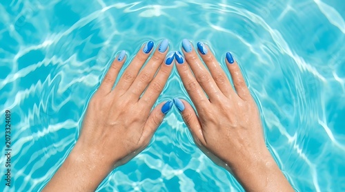 Blue Ocean Wave Nail Art Design on Almond Nails with Hands Touching Turquoise Swimming Pool Water