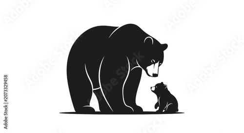 Foto Mother bear and cub sitting together in a tender moment