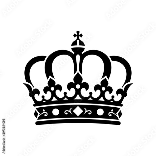 Fotografie A black crown silhouette sits on a plain background with a cross on top