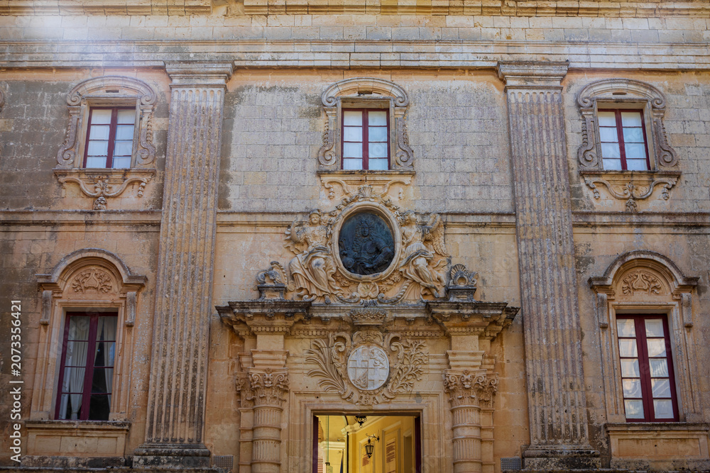 Obraz premium Historic fortified city of Mdina with ancient stone walls and architecture in Malta