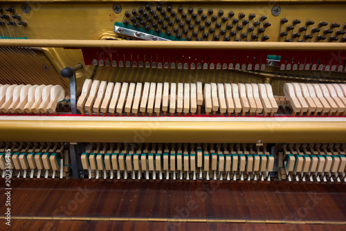 Old retro piano, musical instruments, vintage piano outdoors. Musical background.