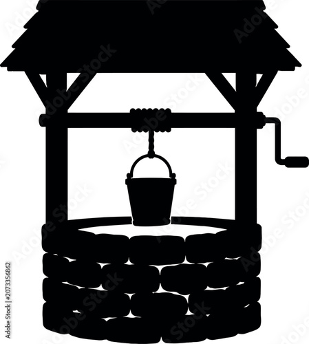 Black silhouette of an old fashioned stone water well with a wooden bucket
