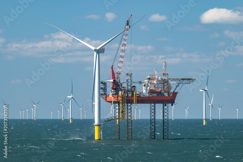 Schilderij op canvas Offshore wind turbine installation vessel of the Burbo Bank windfarm in the Irish Sea near the UK coast between Heysham and the Isle of Man
