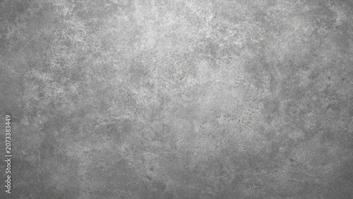 Fotografie Gray textured concrete wall surface with rough and weathered appearance industri