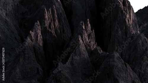 Dark Rugged Mountain Cliffs With Dramatic Jagged Rock Peaks