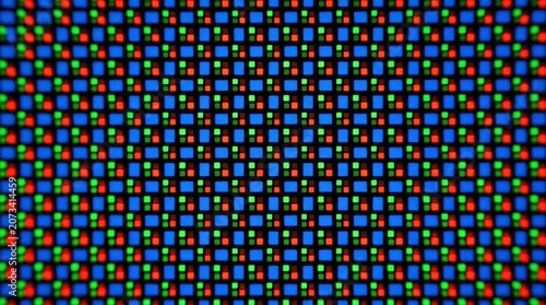 Display Pixels Macro Close-Up of Colorful Red Green Blue Square Light Elements on a Dark Grid Background