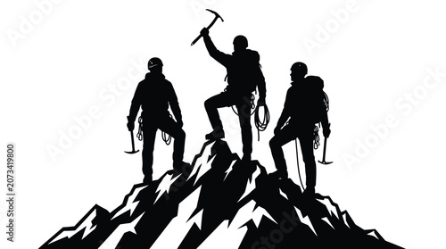 Three professional mountain climbers stand triumphantly on a sharp peak holding black ice axe tools