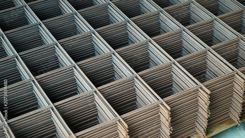 Stacked sheets of welded wire mesh for concrete reinforcement