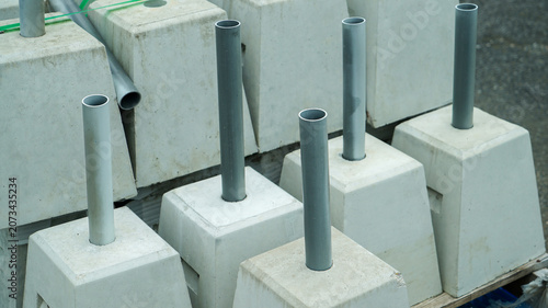 Concrete foundation blocks with plastic pipes