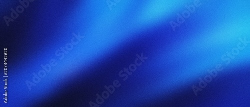 Deep blue gradient background with soft light streaks and subtle texture for abstract design concepts