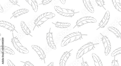 Seamless repeating pattern of delicate hand-drawn bird feathers scattered randomly over a clean white background for fabric prints.